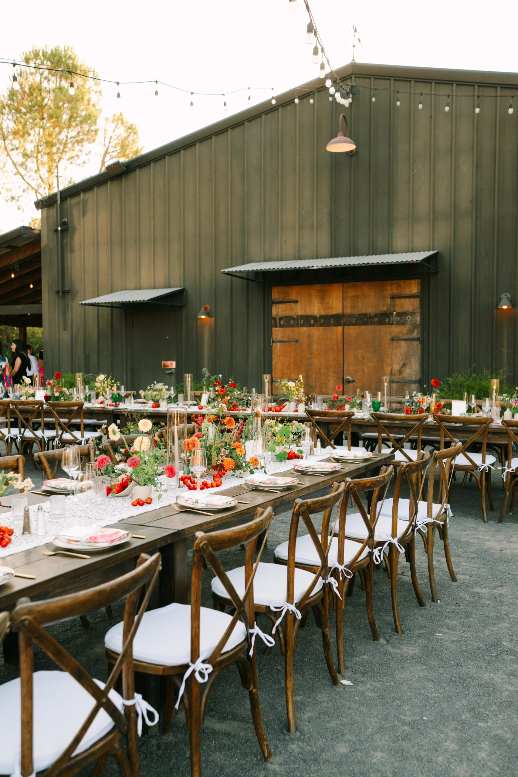 Farm tables outside barn