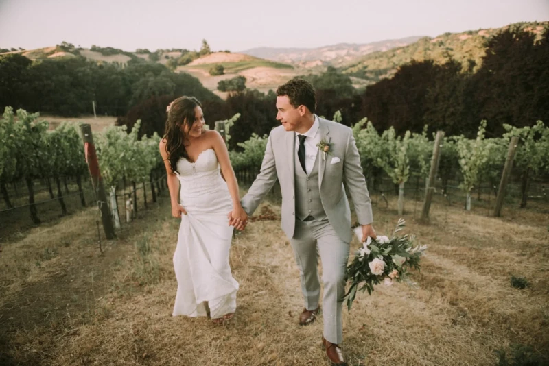 Bride and Groom in vineyards at The Highlands Estate