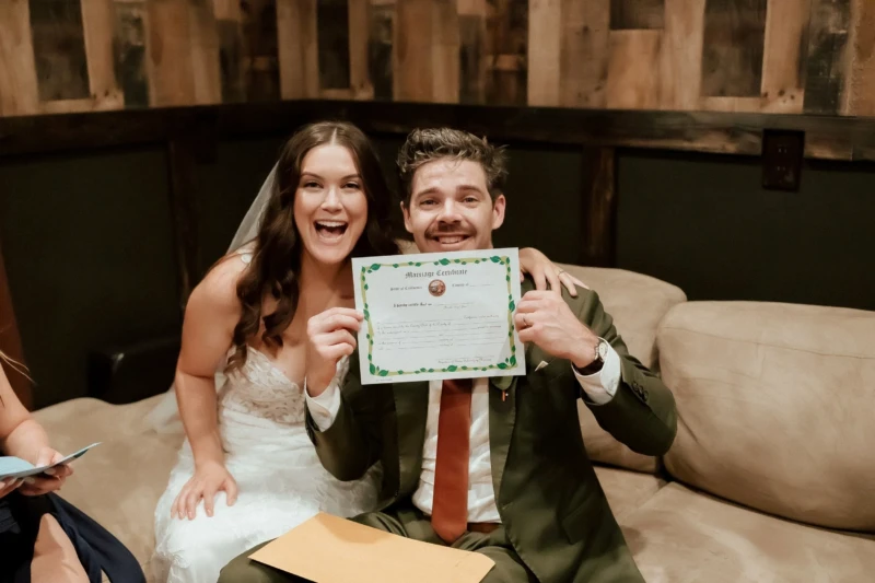 Bride and Groom signing Marriage License in Groom Room